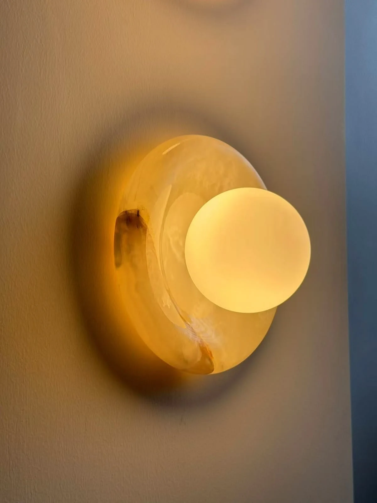 Golden light and sculptural details in a studio interior